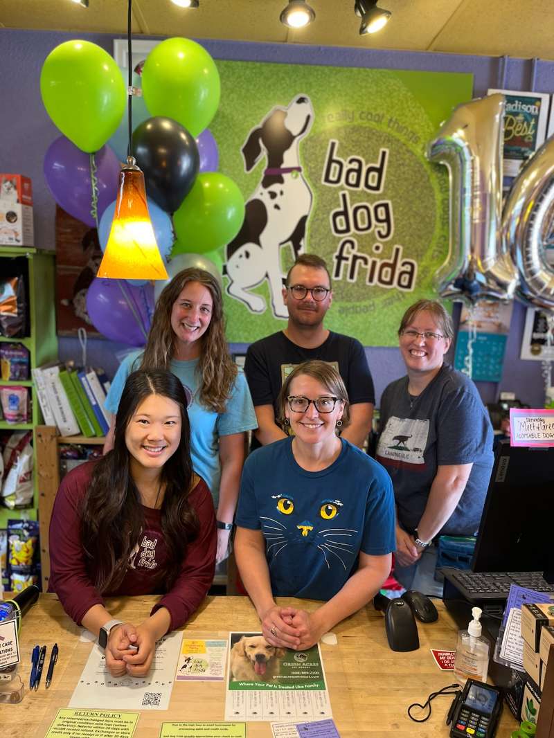 store staff in front of store